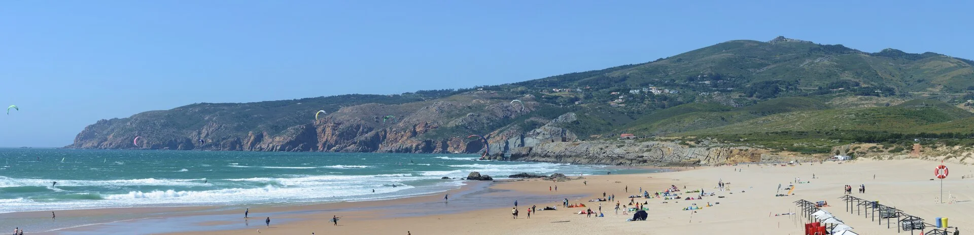 Cascais coastal town in Portugal with colorful buildings, marina, and sandy beach