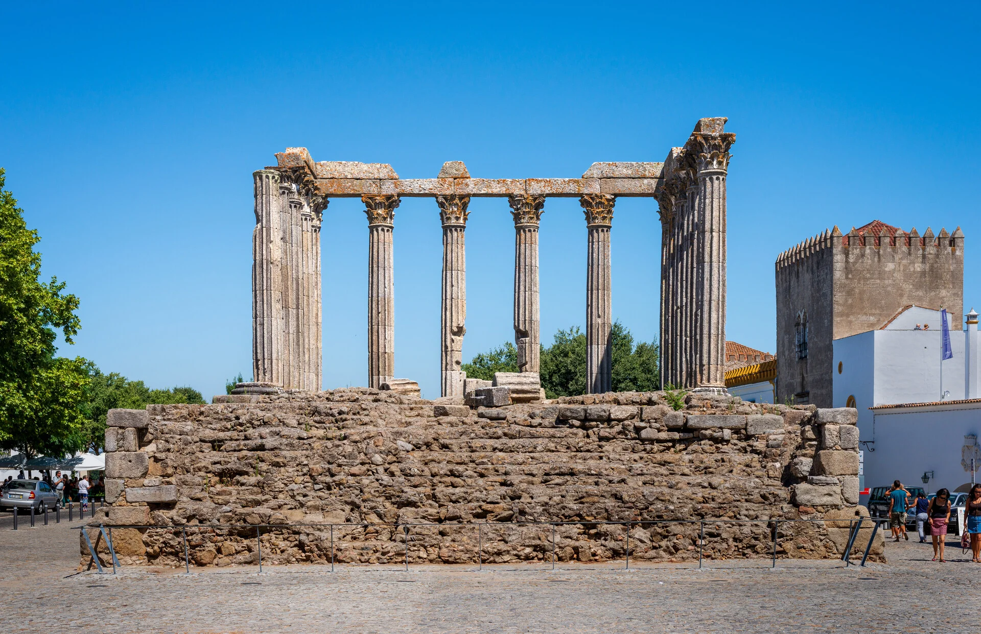 Roman Temple of Diana in Évora, Portugal with its Corinthian columns against a blue sky
