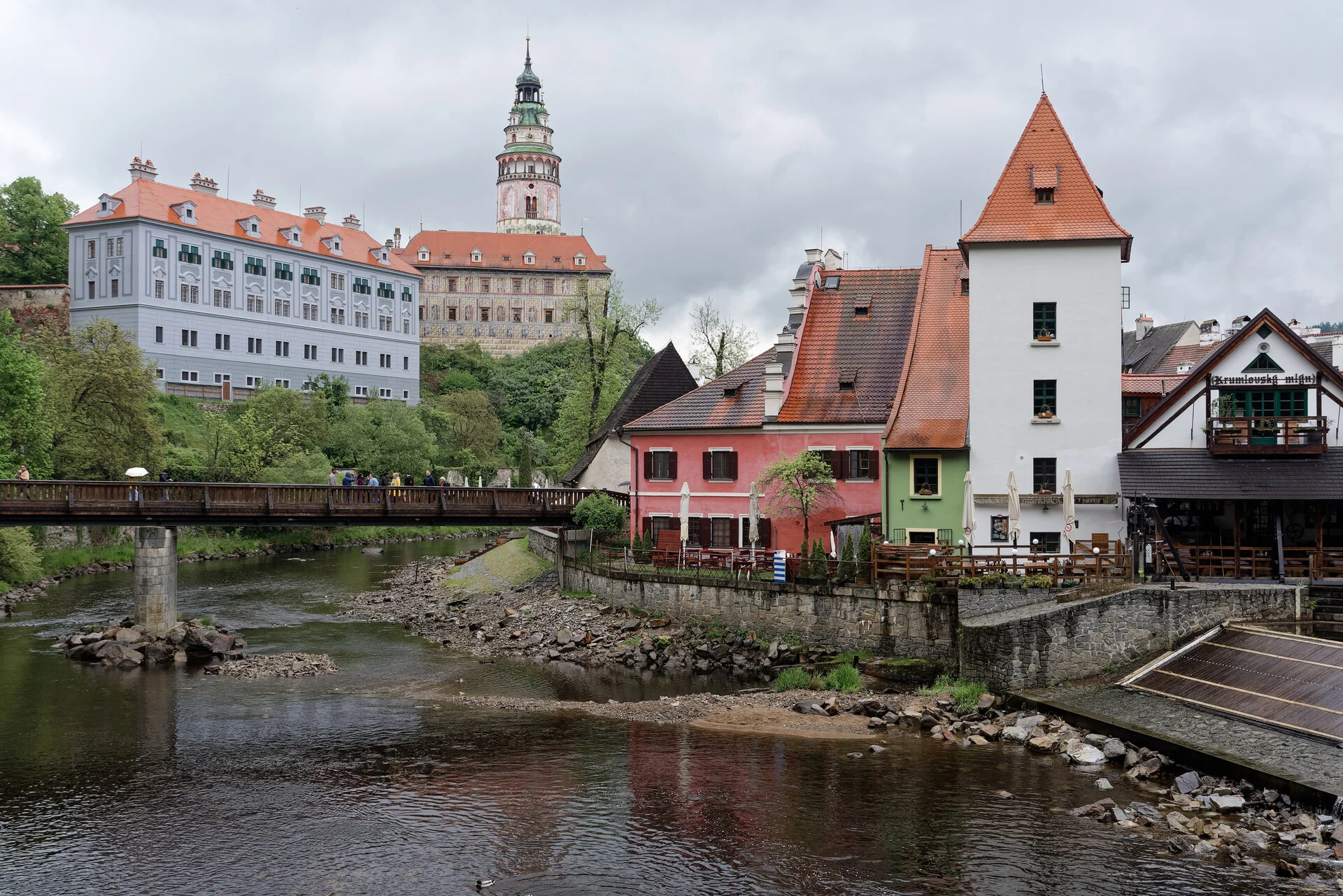 Český Krumlov medieval town and painted castle tower above the Vltava river bend