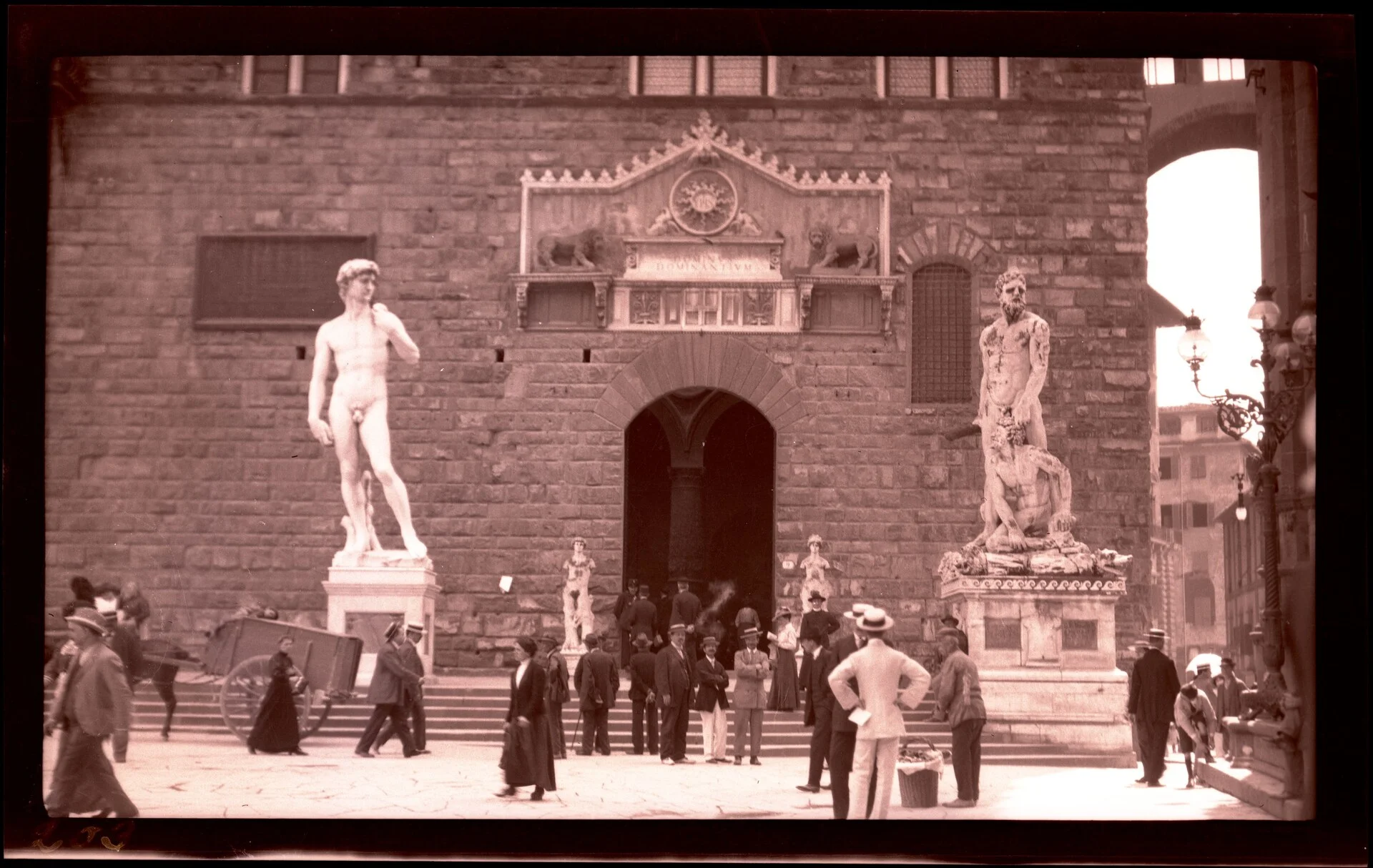 Michelangelo's David beside the entrance of Palazzo Vecchio in Piazza della Signoria, Florence