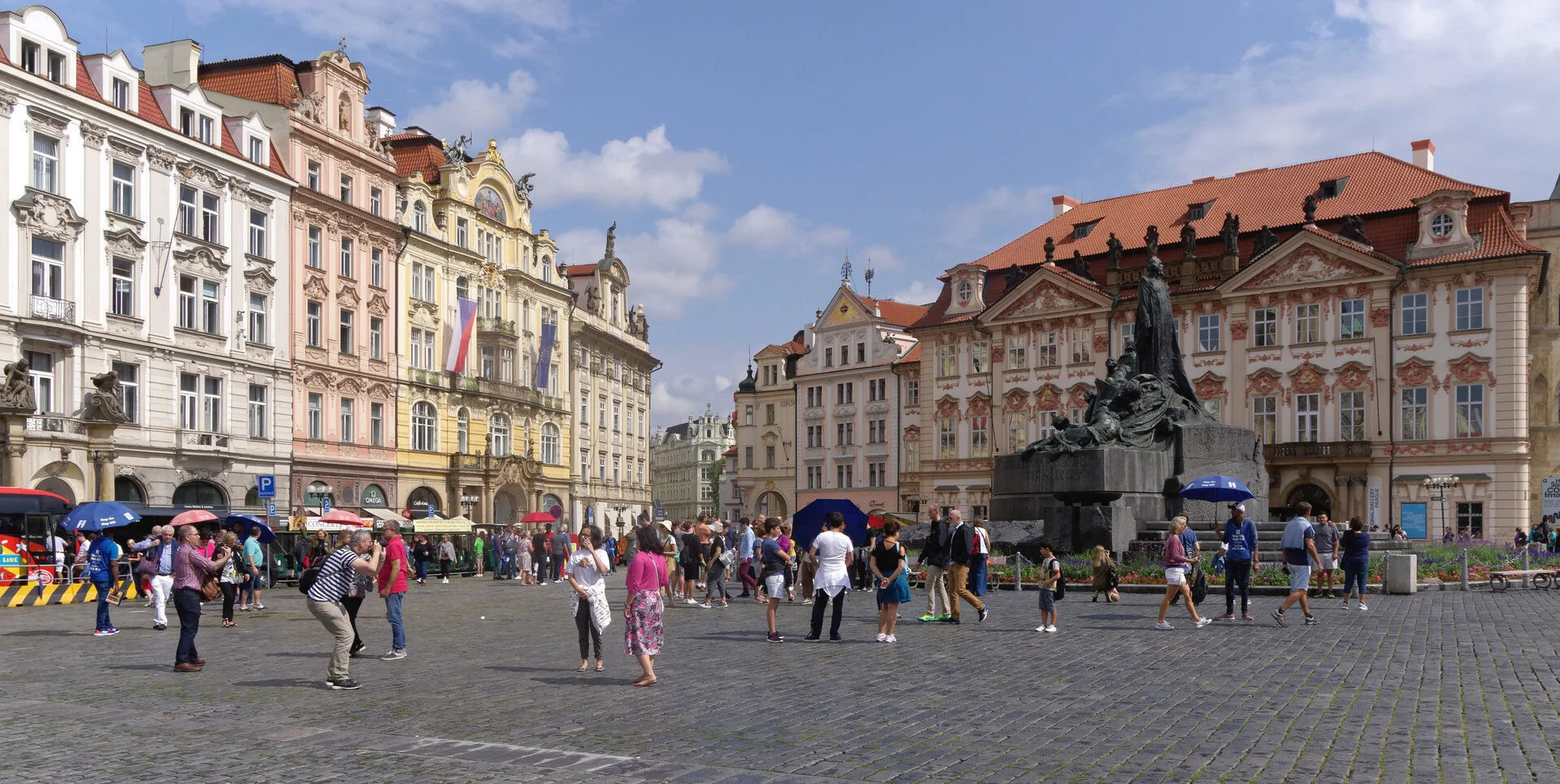 Old Town Square in Prague with the Astronomical Clock on the Old Town Hall and the twin Gothic towers of Týn Church