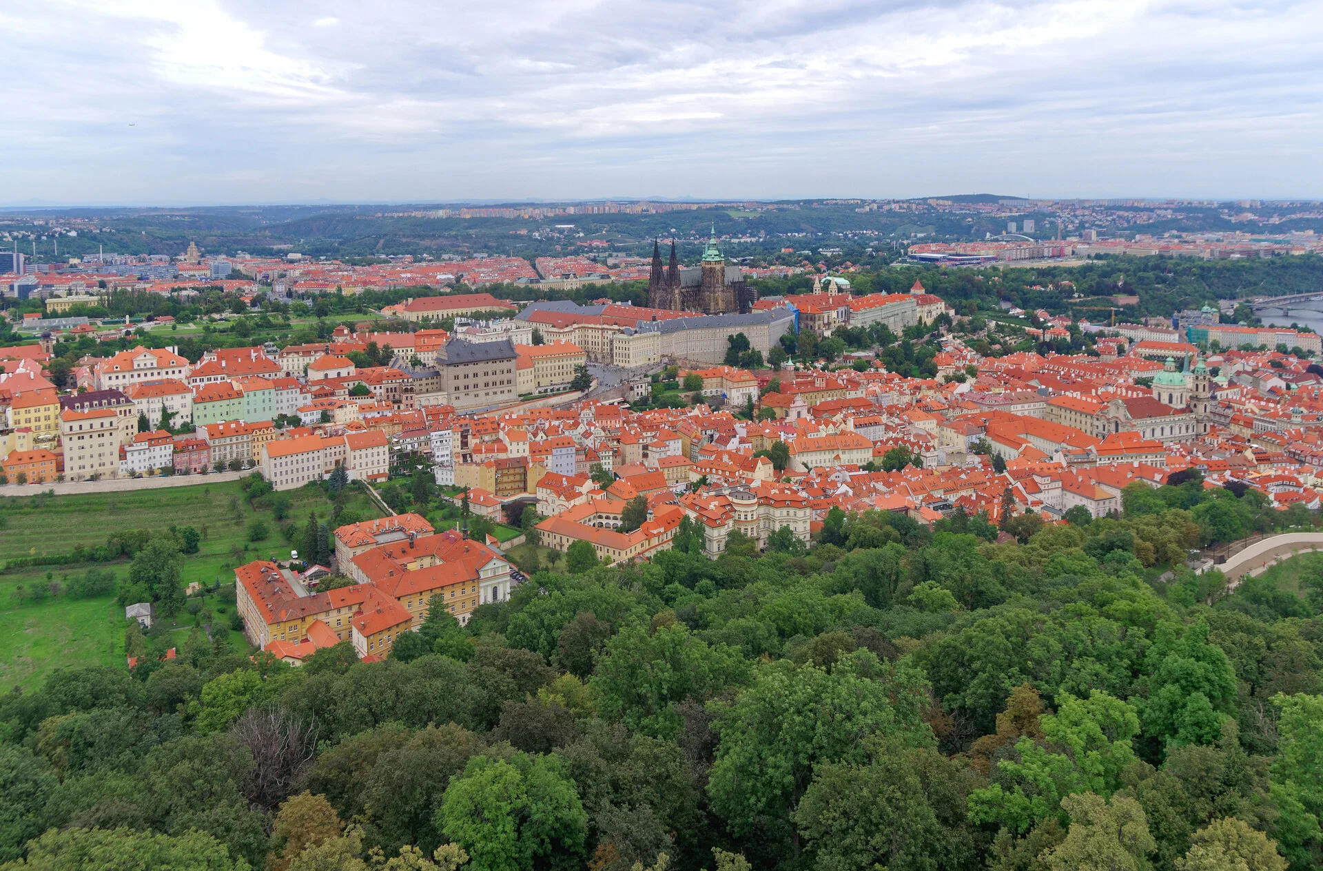 Sweeping panoramic view of Prague rooftops from Petřín Hill