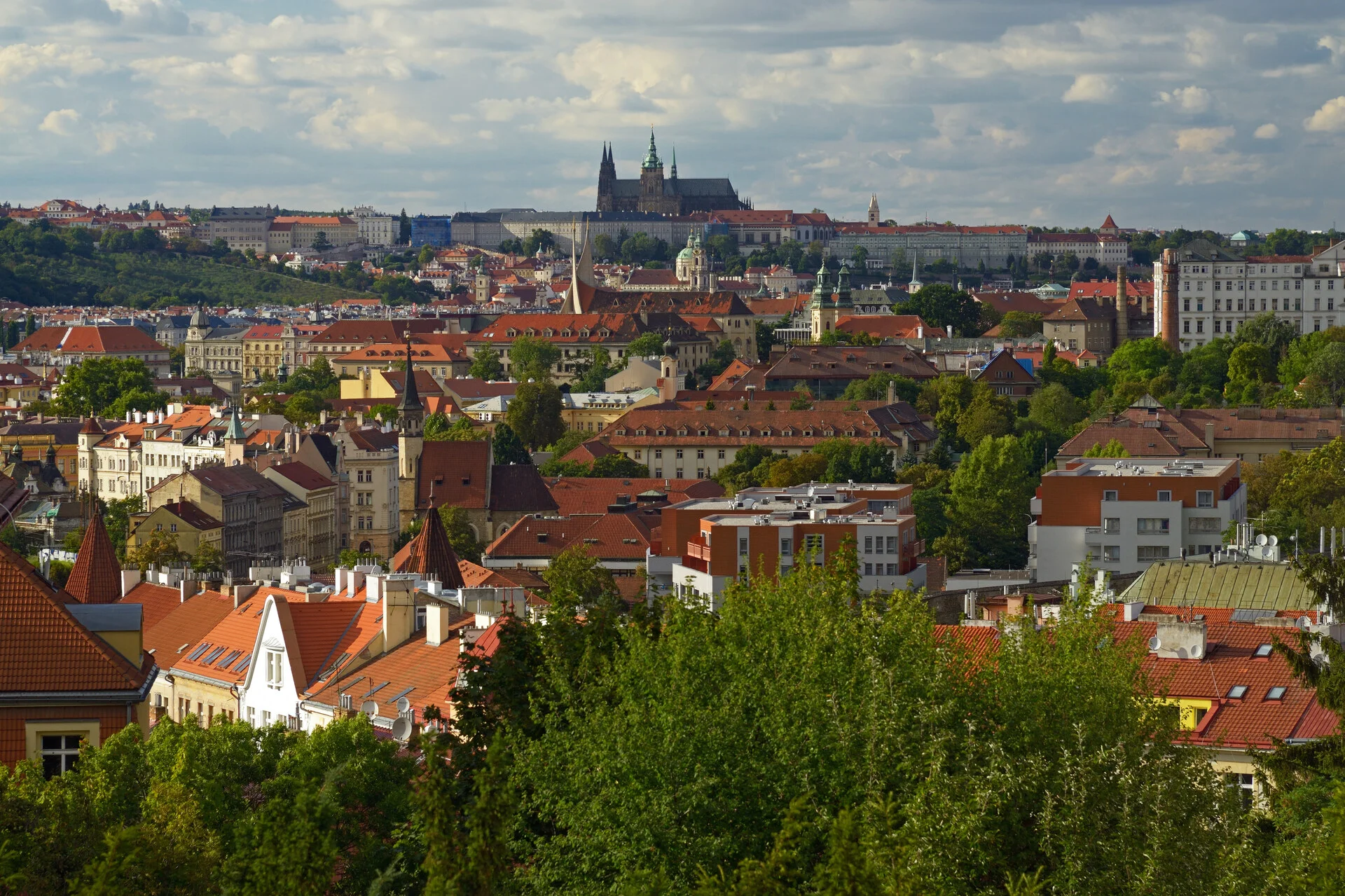 Prague Castle complex with St. Vitus Cathedral's Gothic spires rising above the city skyline