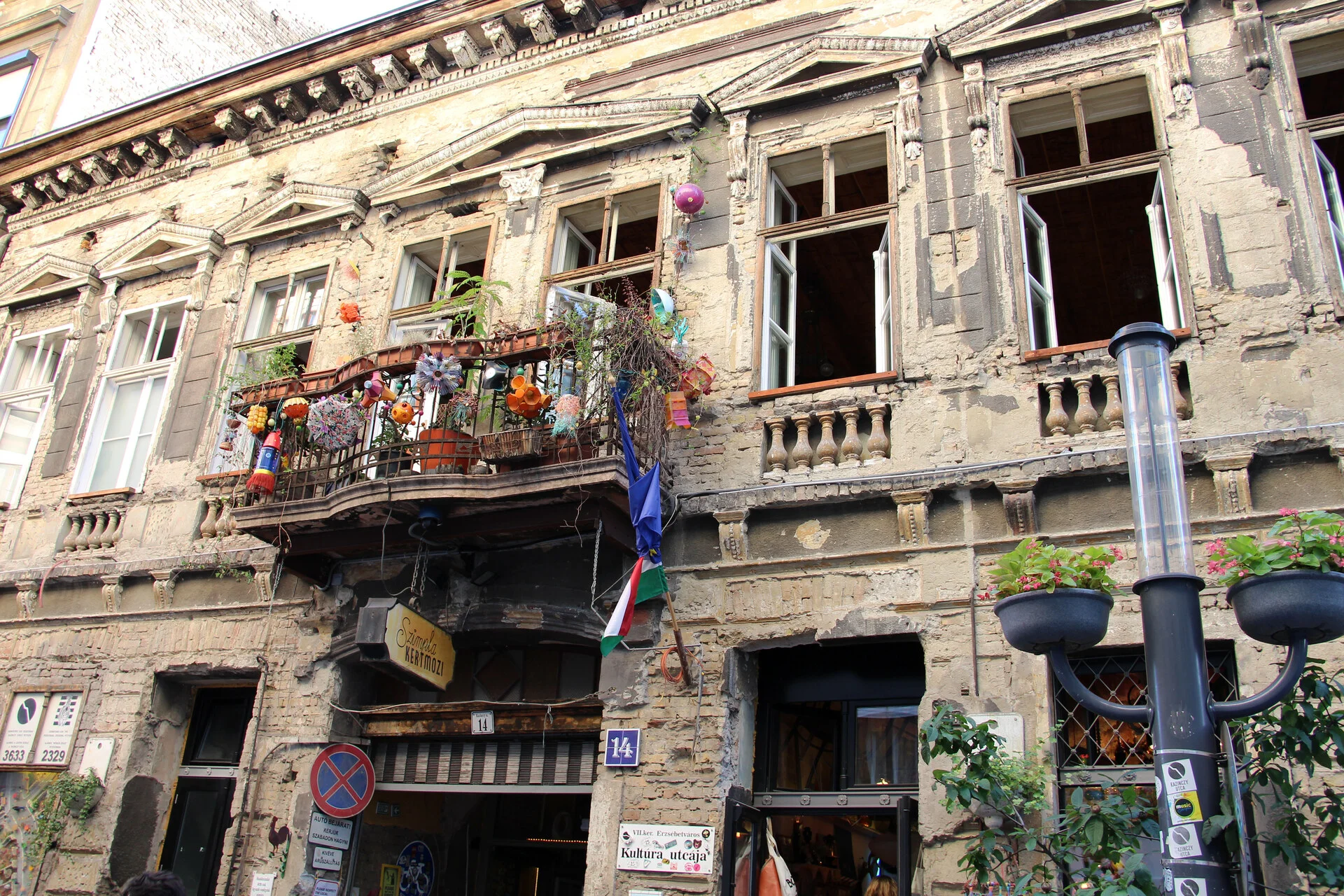 The eclectic interior courtyard of Szimpla Kert ruin bar in the Jewish Quarter of Budapest